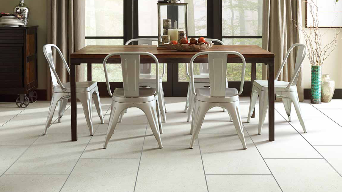 Tile flooring in a dining room, installation services available.
